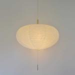 こまのような形をしたデザイン