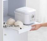 前方にスライドするトレー